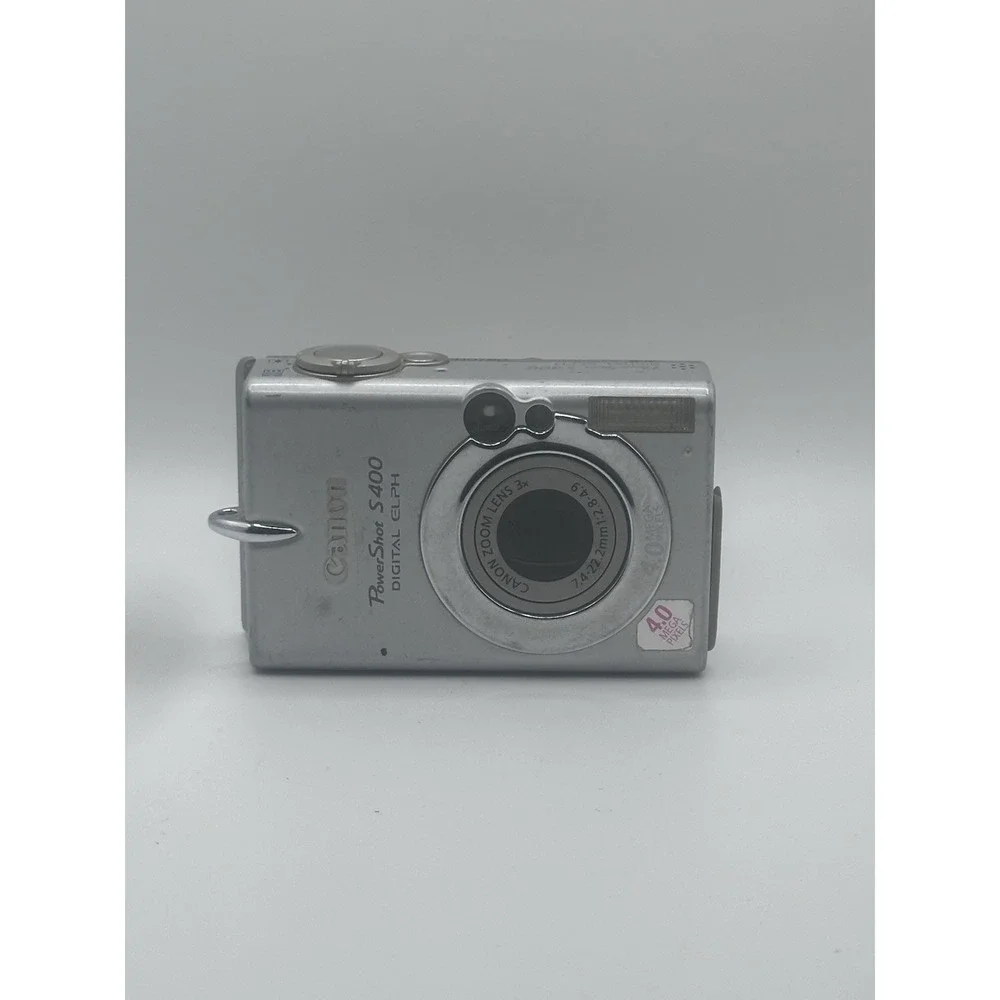 Canon PowerShot S400 Digital ELPH 4.0MP Silver Camera Untested For Parts/Repair